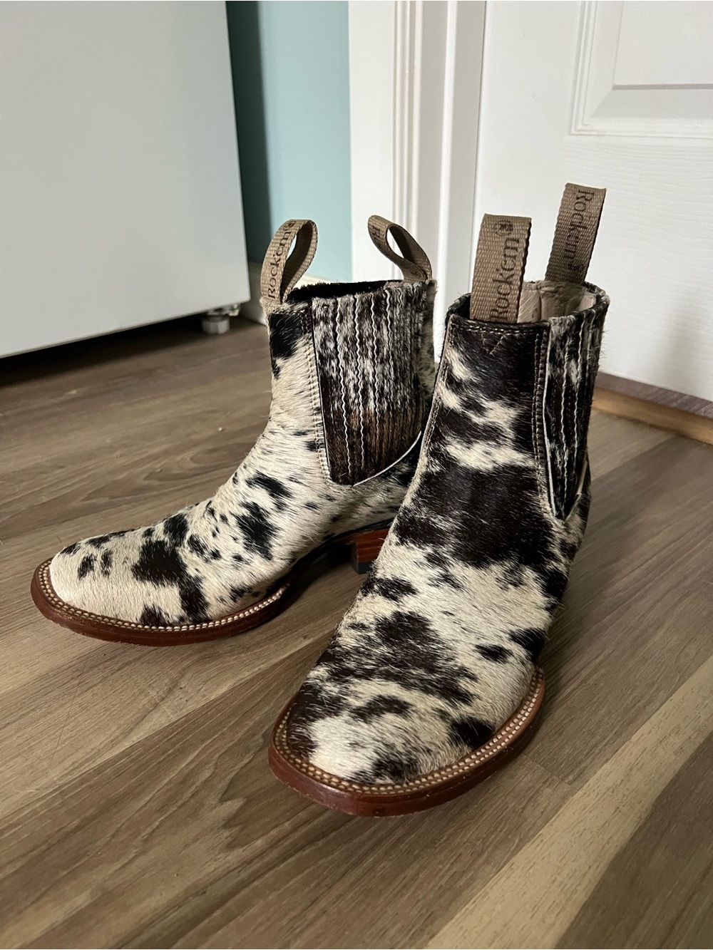 Rock’em Black & White Cowhide Booties